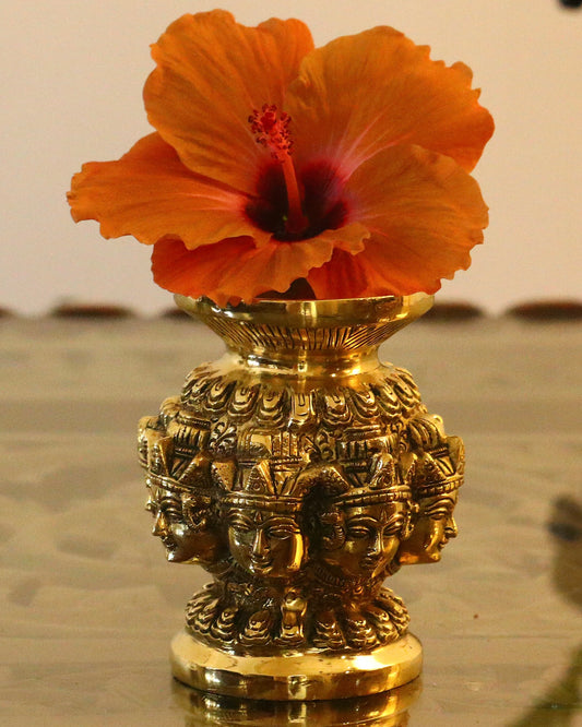 Brass Vase Engraved with Buddha Faces